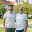 Bahnhof-Apotheke Kempten: Neubau mit Bio-Laden und Kita? Alexander und Dietmar Wolz im Portrait vor einer Parkkulisse